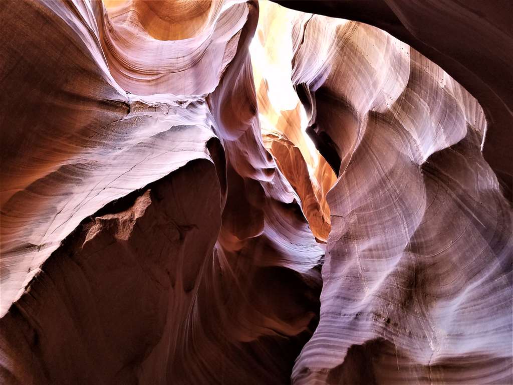 Sunlight glowing on the sculpted sandstone walls of Antelope Canyon near Page, Arizona