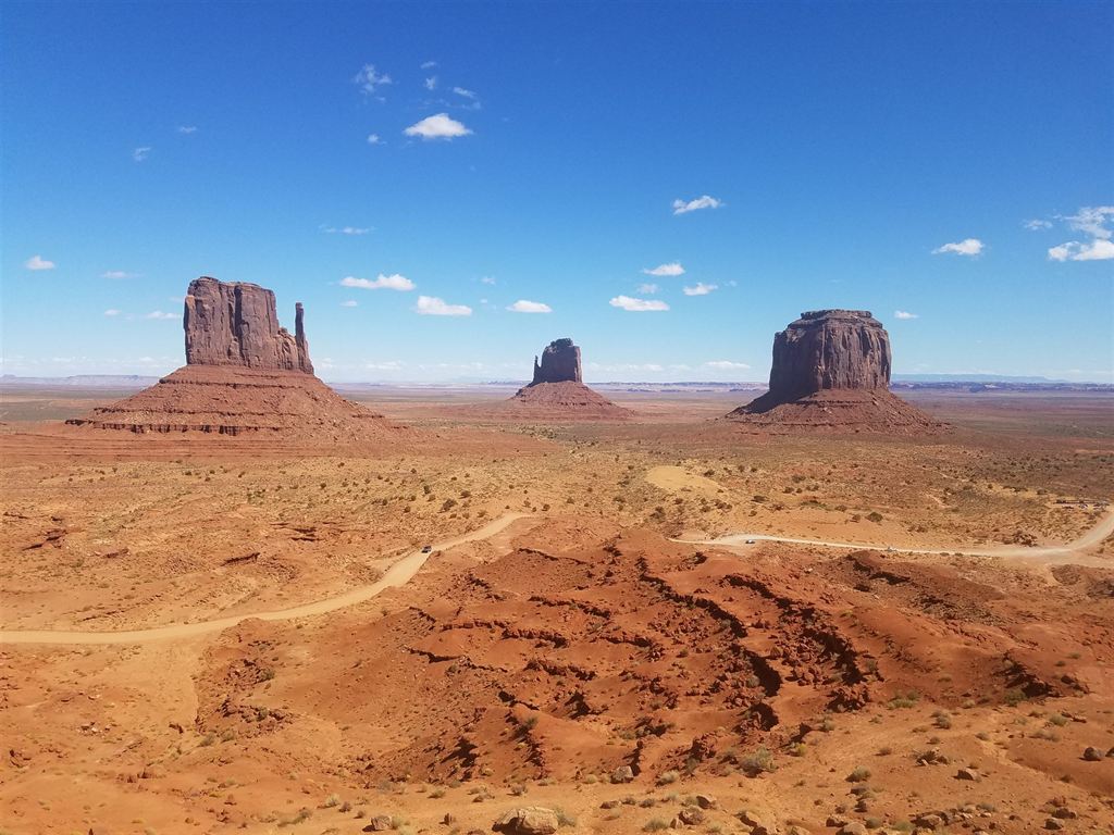 The Mittens and Merrick Butte rising from the valley floor at Monument Valley, Arizona-Utah border